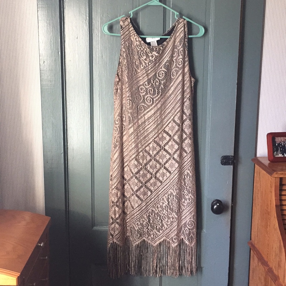 Dress with tassel bottom